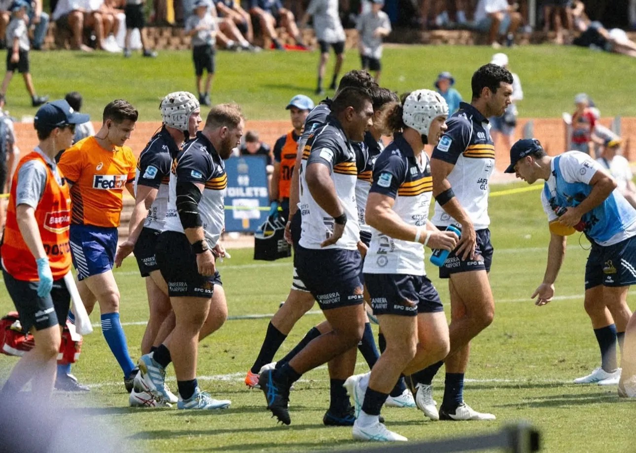 Dr Kimberley Wells pitch-side with the ACT Brumbies